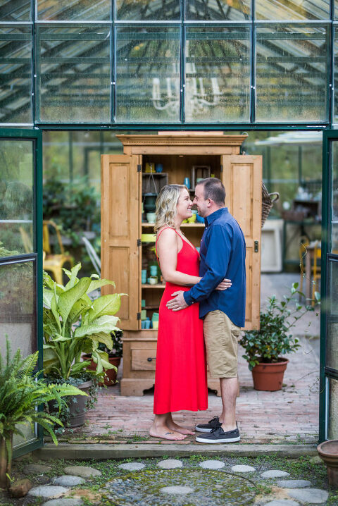 couple in greenhouse red dress Kaitlyn Ferris engaged 