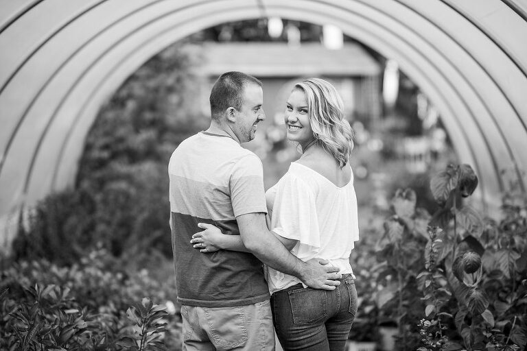 black and white couple in greenhouse Kaitlyn Ferris engaged 