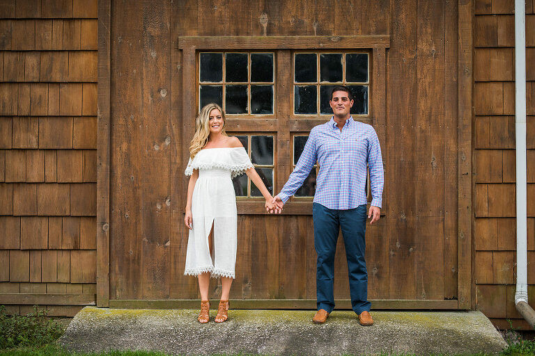 barn door two people romantic engagement