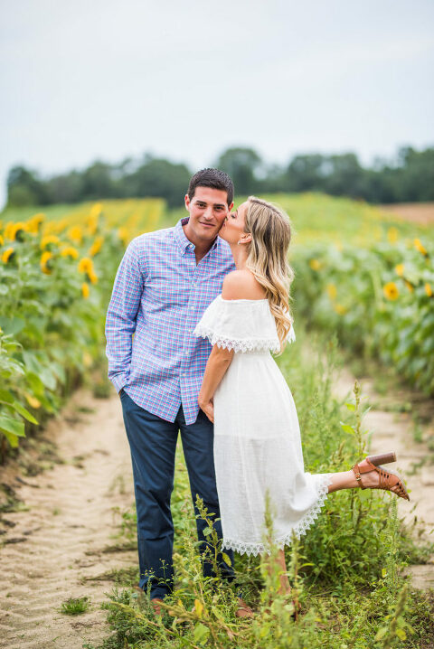 romantic engagement sunflower field