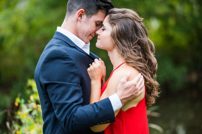 snuggled up red dress summer engagement 