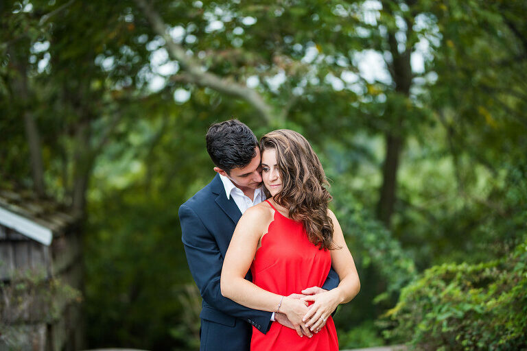 looking at each other red dress summer engagement