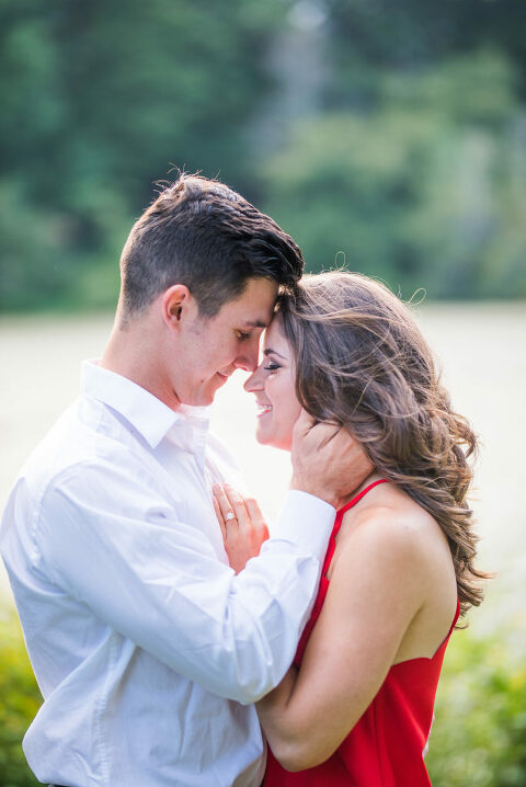 forehead smile red dress summer engagement 