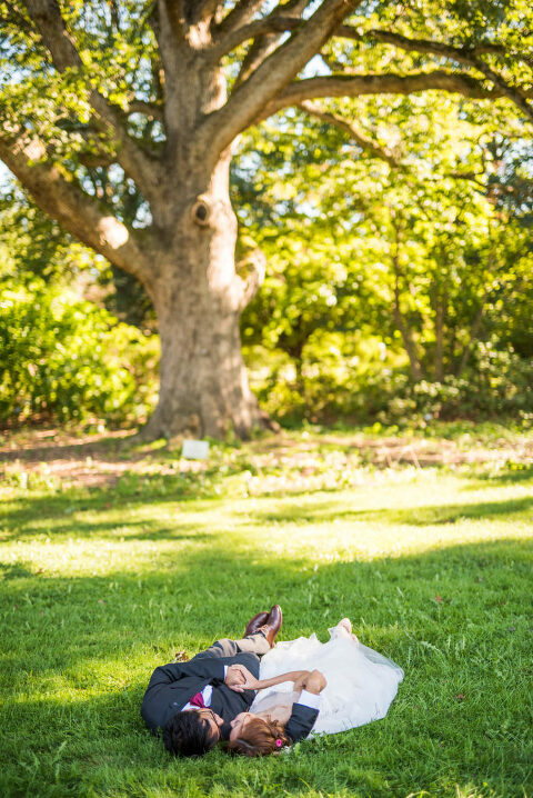 laying down under a tree Kaitlyn Ferris photography garden wedding
