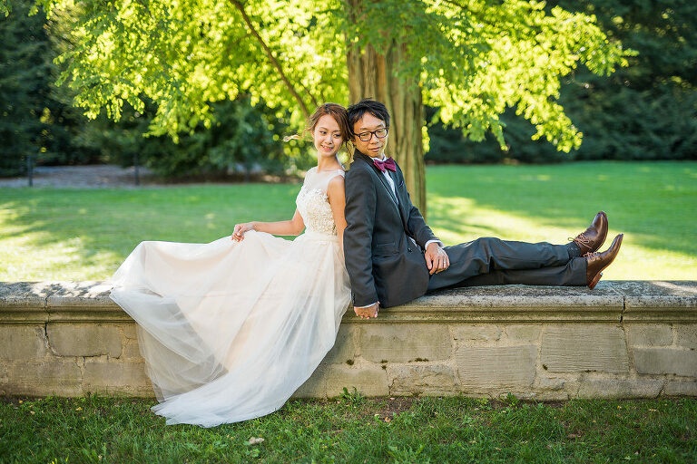 bride and groom sitting Kaitlyn Ferris photography garden wedding