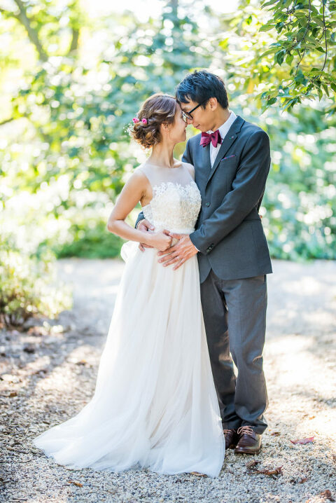 bride and groom holding each other Kaitlyn Ferris photography garden wedding