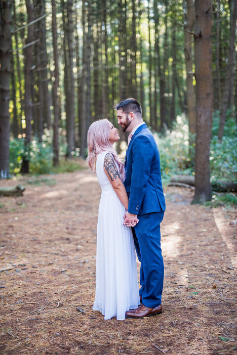 couple in woods Kaitlyn Ferris Photography Long Island Wedding Photographer